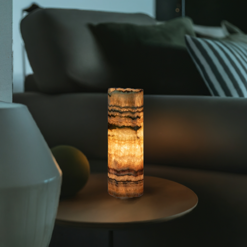 Desert onyx lamp on a small side table next to sofa